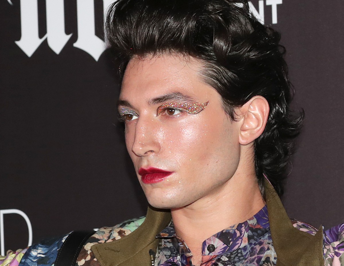 Ezra Miller settles with.  What terms did DC agree to onscreen?