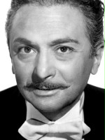 Marcel Dalio / Kapitan Renaud (1955-1956)