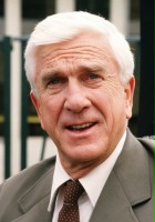 Leslie Nielsen / Prezydent Baxter Harris