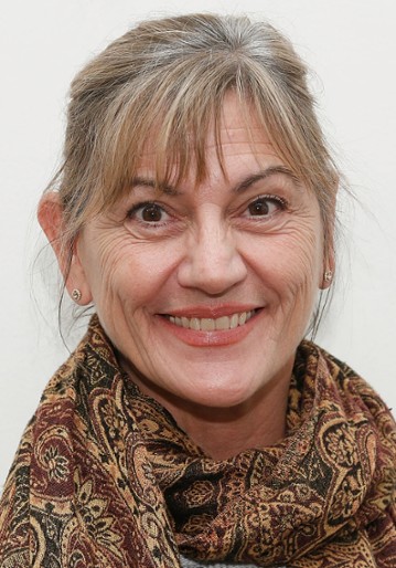 Janet Ulrich Brooks / Asystentka